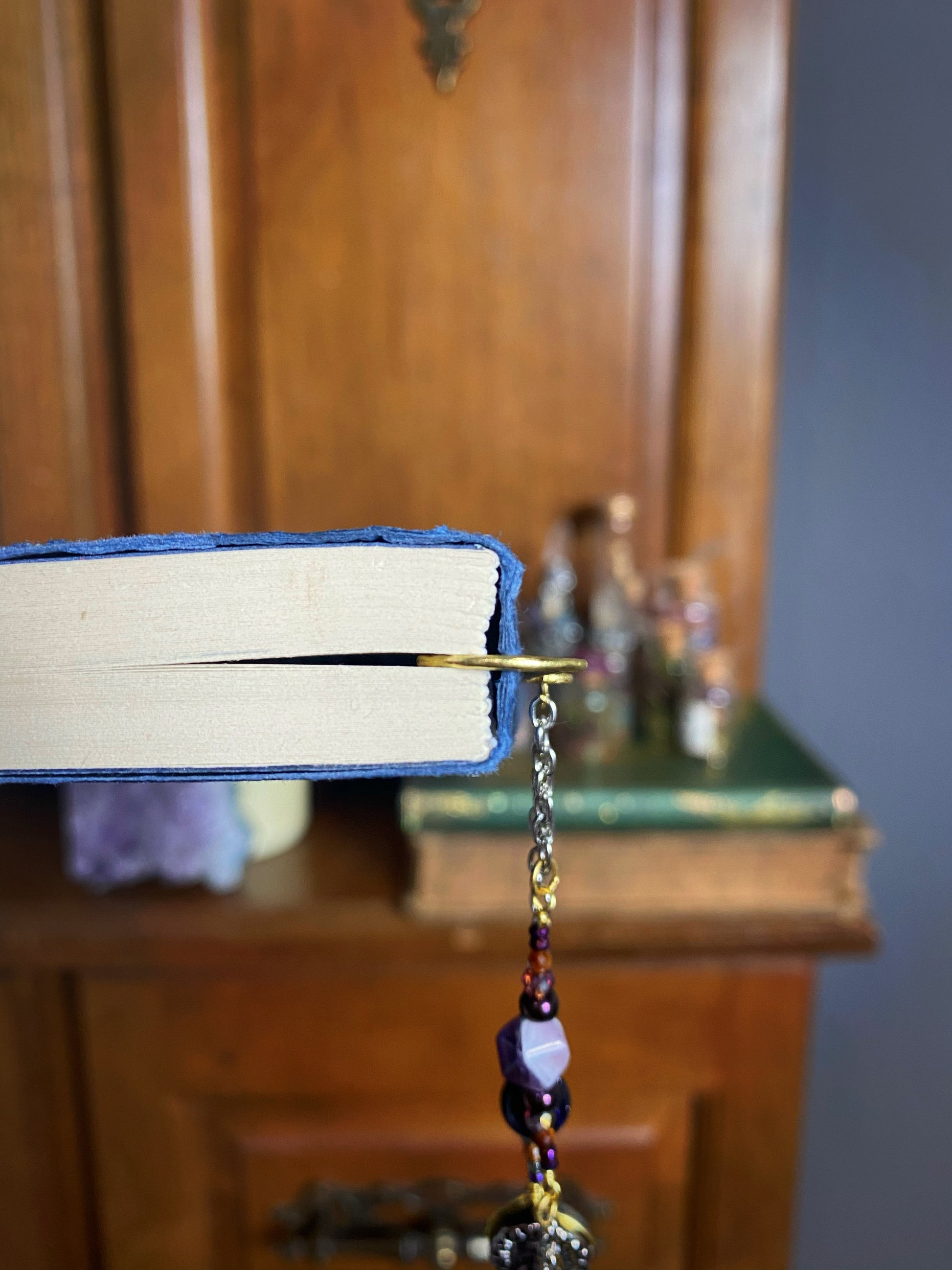 closed book with a beaded dangly bookmark