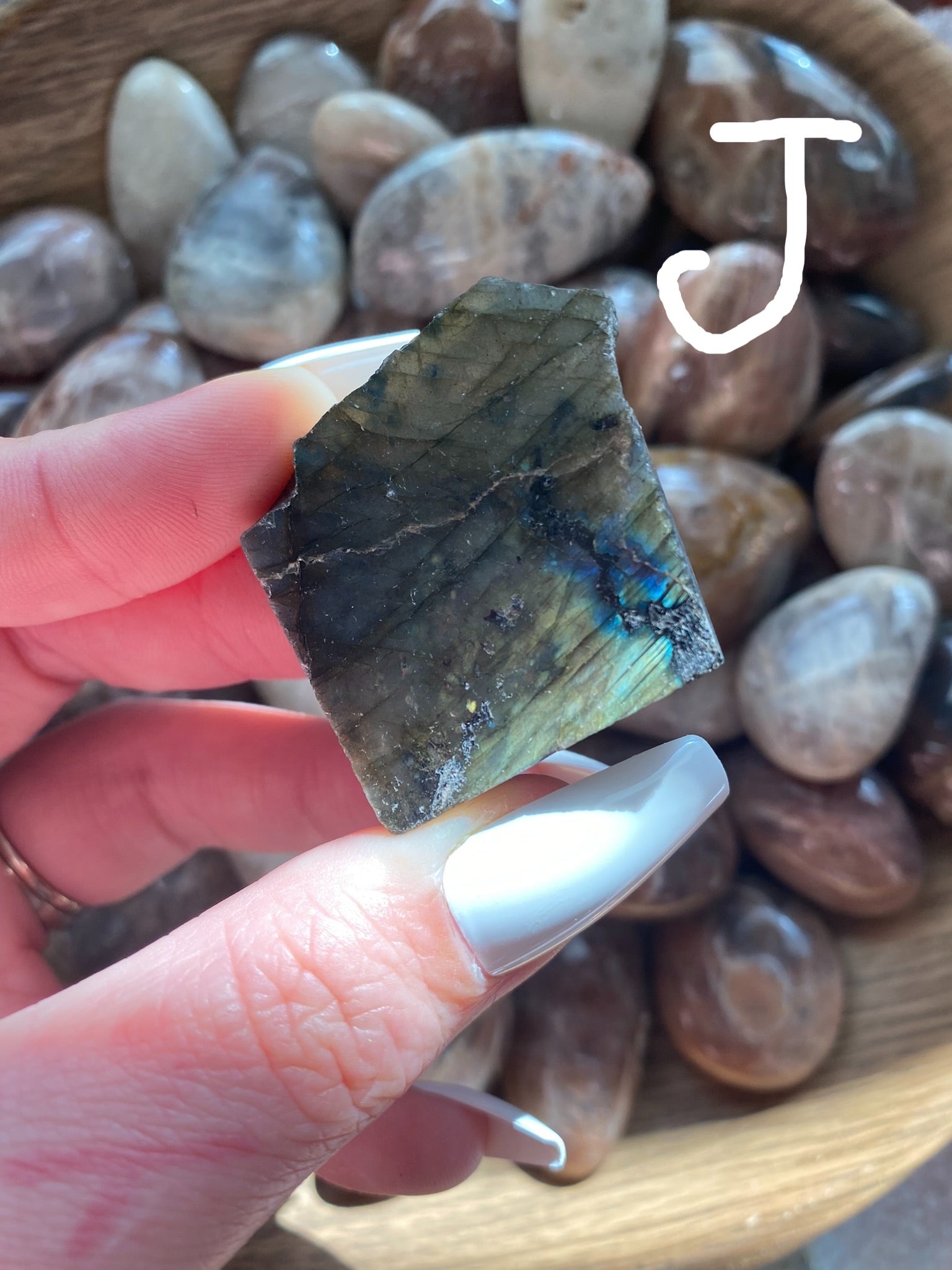 labradorite with orange, blue, and green flash