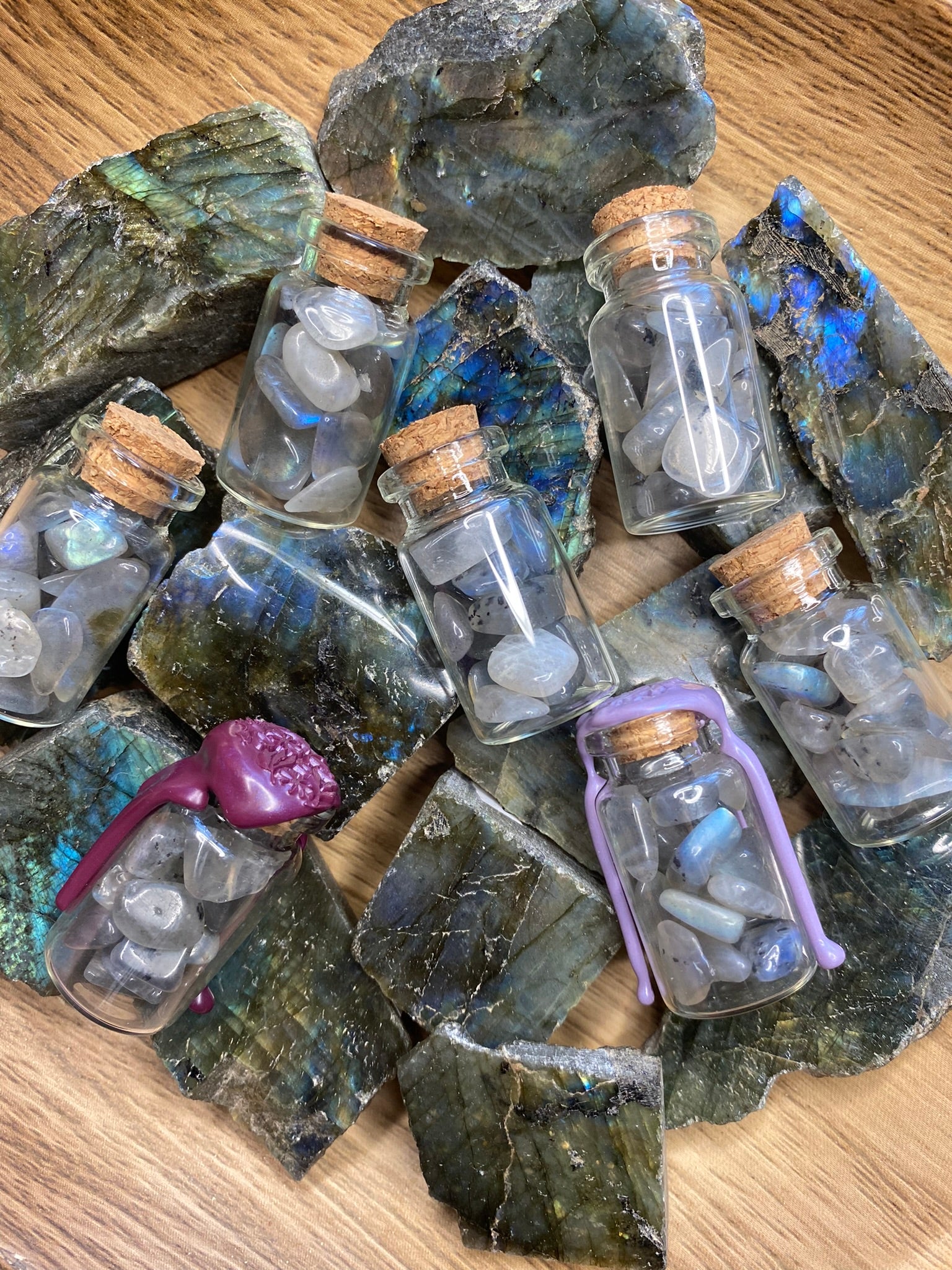 labradorite and labradorite chip bottles in wooden bowl