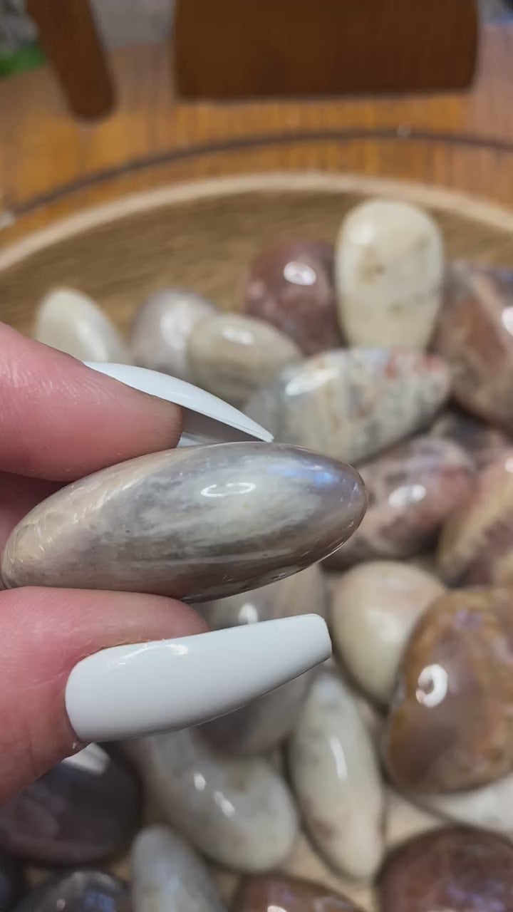 video of white moonstone with sunstone